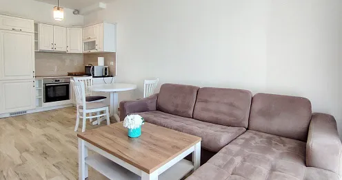Apartments in a complex with a swimming pool on the first line by the sea